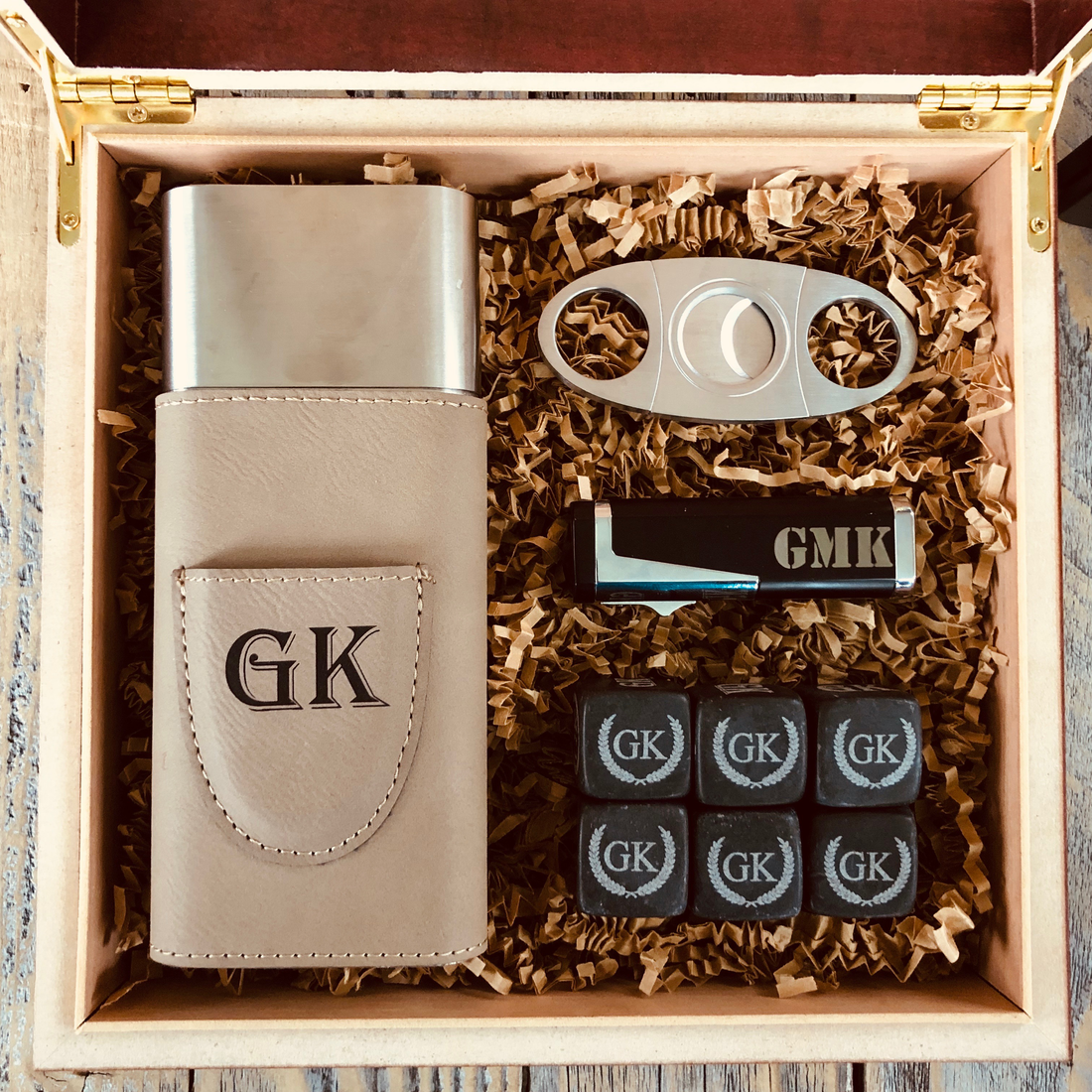 Personalized cigar enthusiast gift set with whiskey stones, travel case, cutter, and torch lighter